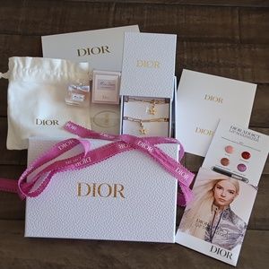 Dior gold phone charm